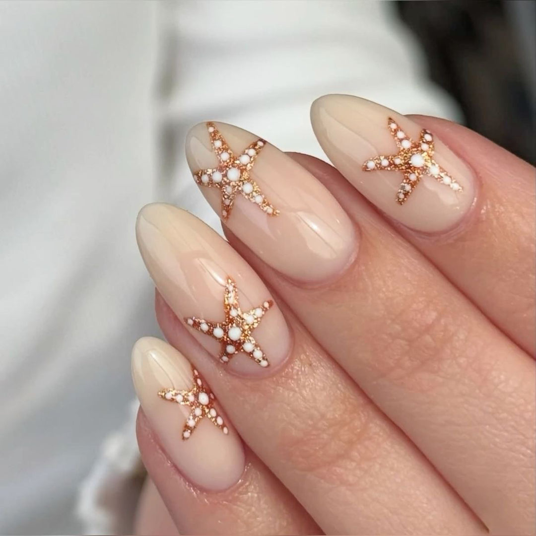 Artistic acrylic nails with maritime star designs Kalsten