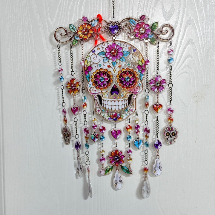 Colorful skull wall decoration in the Day of the Dead style with acrylic beads and crystal pendants