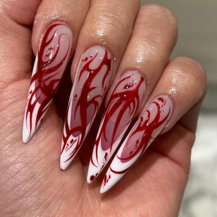 Creative Stiletto Nail Art with Blood Red Accents Kalsten