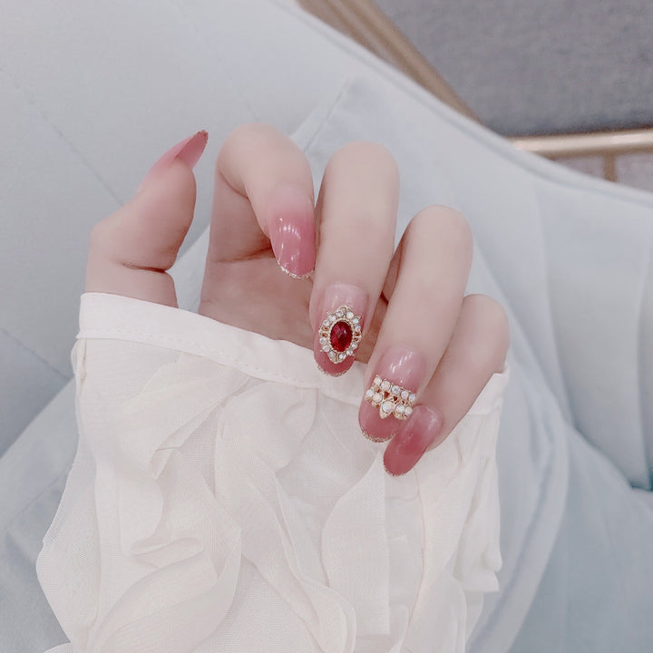 Artful nail extensions with an elegant leaf pattern Kalsten