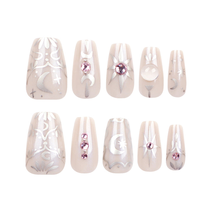 Artificial nail art with elegant rhinestone and glitter effects Kalsten