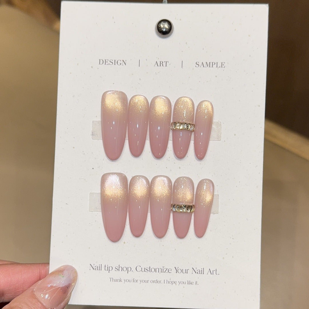 Glamorous artificial nails with elegant glitter and rhinestone application Kalsten