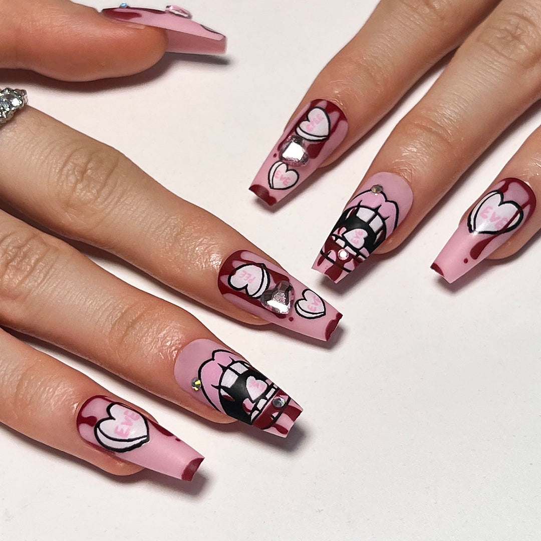 Artful stiletto nails with hearts and glitter accents Kalsten