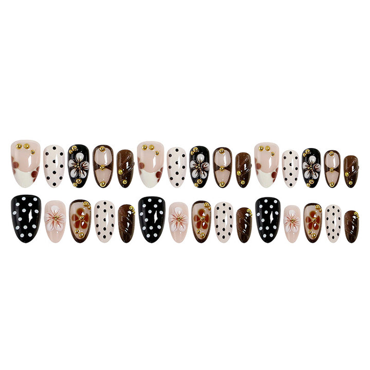 Art nail set with floral accents and elegant 3D decorations Kalsten