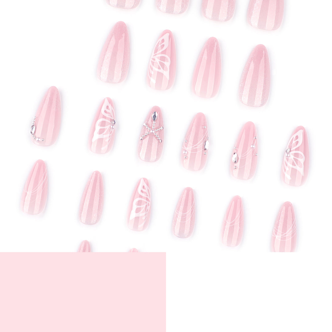 Artful nail extensions with delicate flower and glitter accents Kalsten