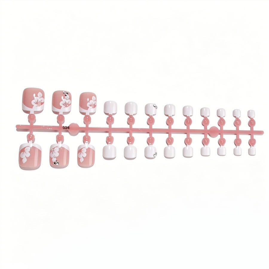 Nail art set with elegant flower design and glitter accents Kalsten