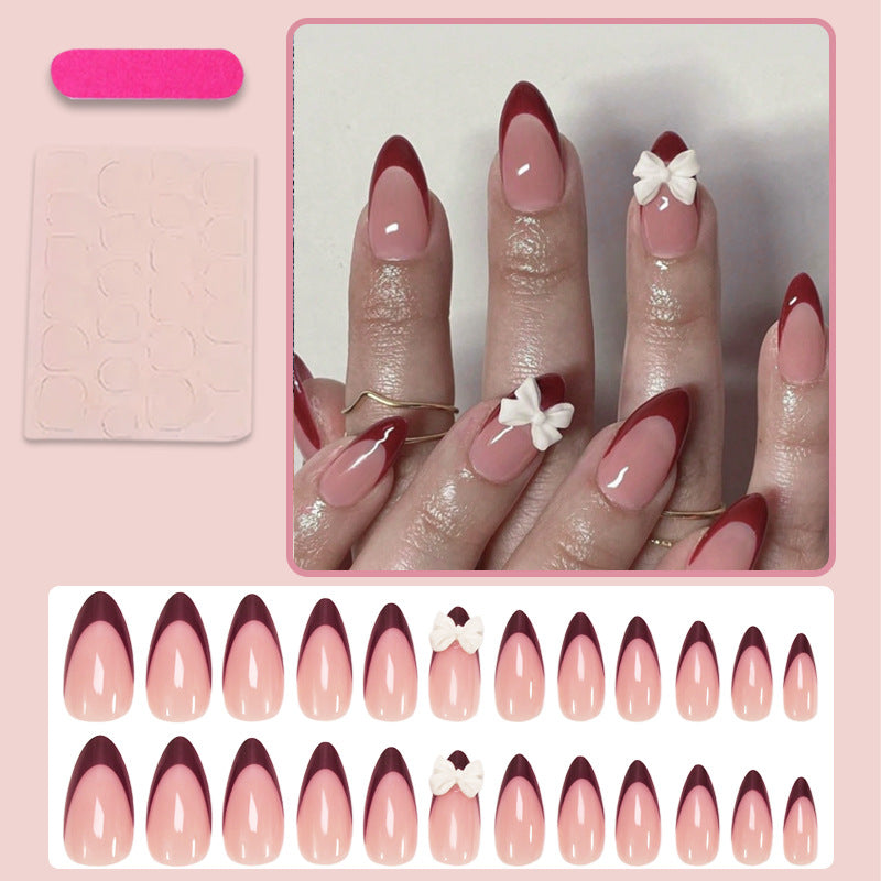 Acrylic nail set with elegant lace design and romantic bows Kalsten