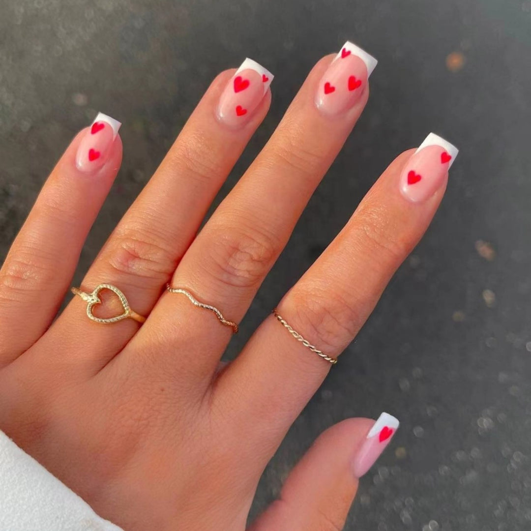 Heart-Embellished French Tip Nail Art Kalsten