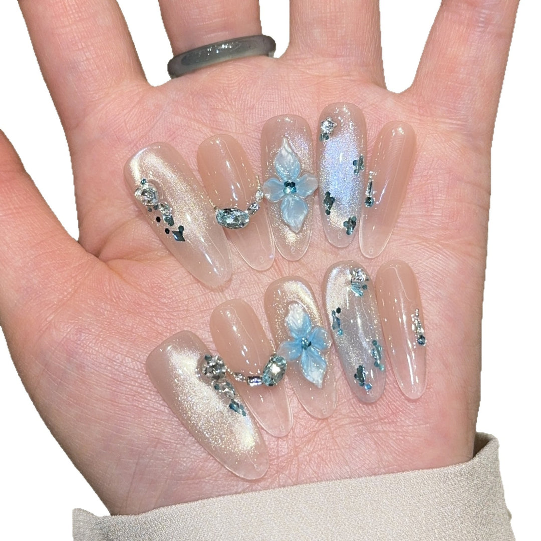 Artificial nails with unique floral design and glitter accents Kalsten