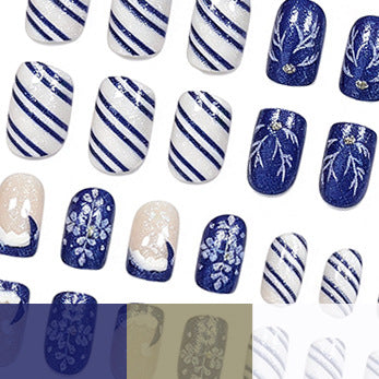 Artistic Winter-Themed Acrylic Nail Art Enhancements Kalsten