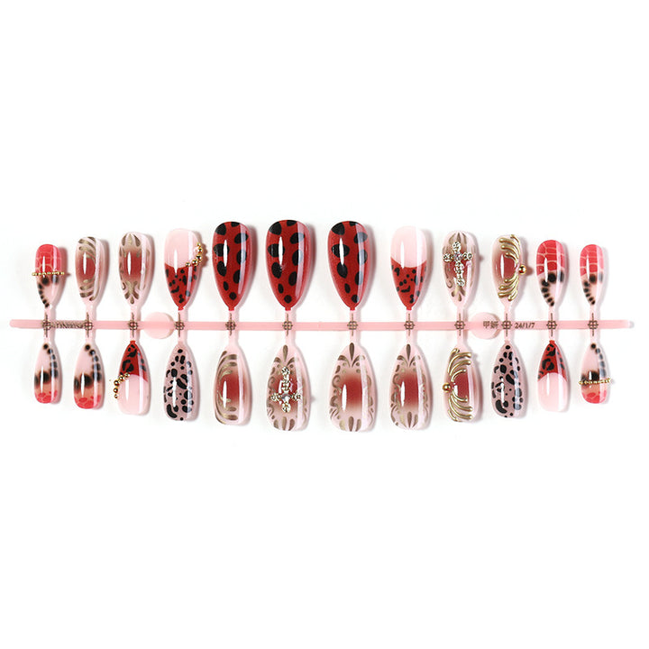 Artificial nail set with vibrant ladybug design and creative accents Kalsten