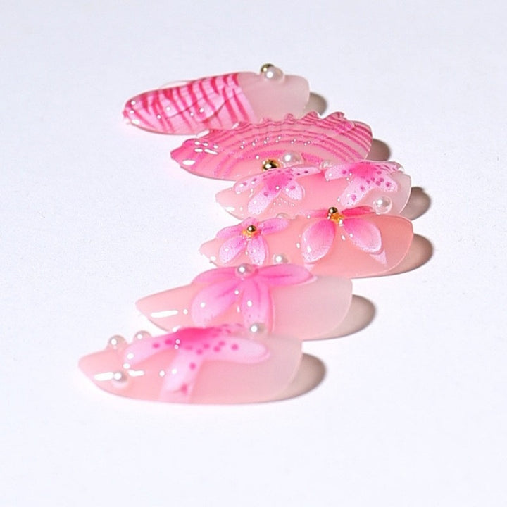 Artificial nail set with intricate 3D flowers and elegant accents Kalsten