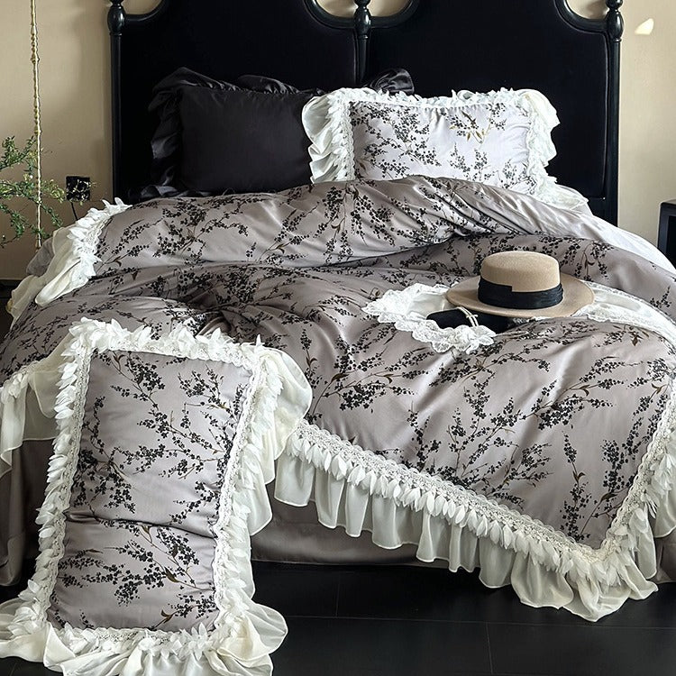 Satin bedding set with floral print duvet, tiered ruffle pillow & lace trim