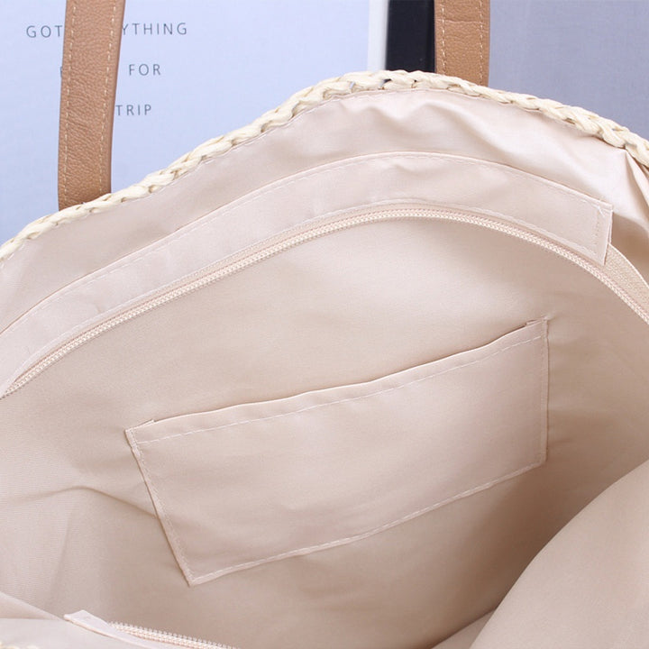 Handwoven beach bag made of natural materials with leather accents Kalsten