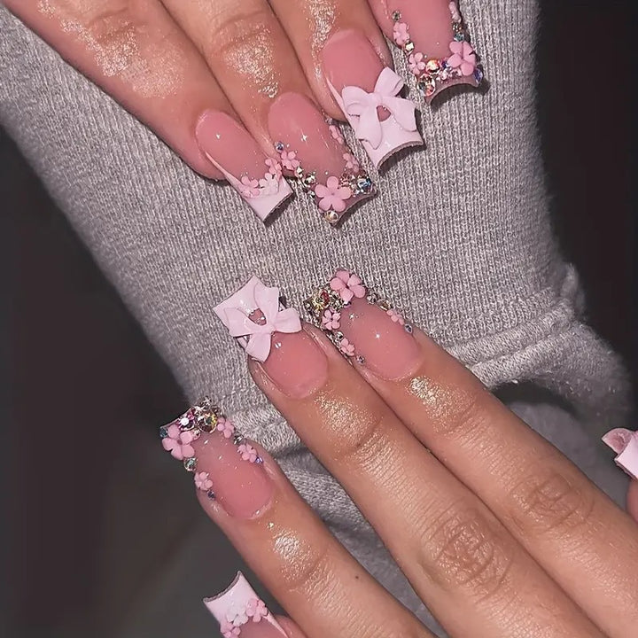 Art nail set with floral 3D accents and glitter decorations Kalsten