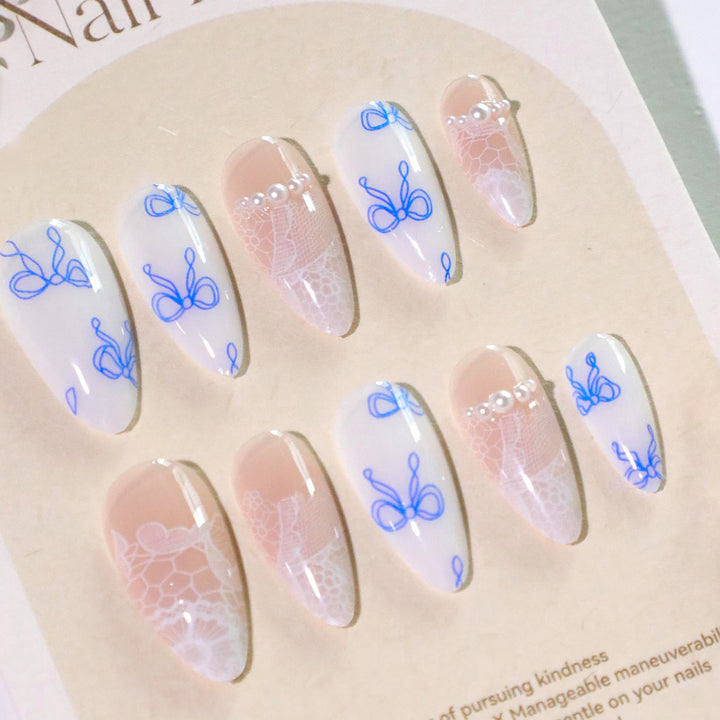 Artistic stiletto nails with delicate bow decorations Kalsten