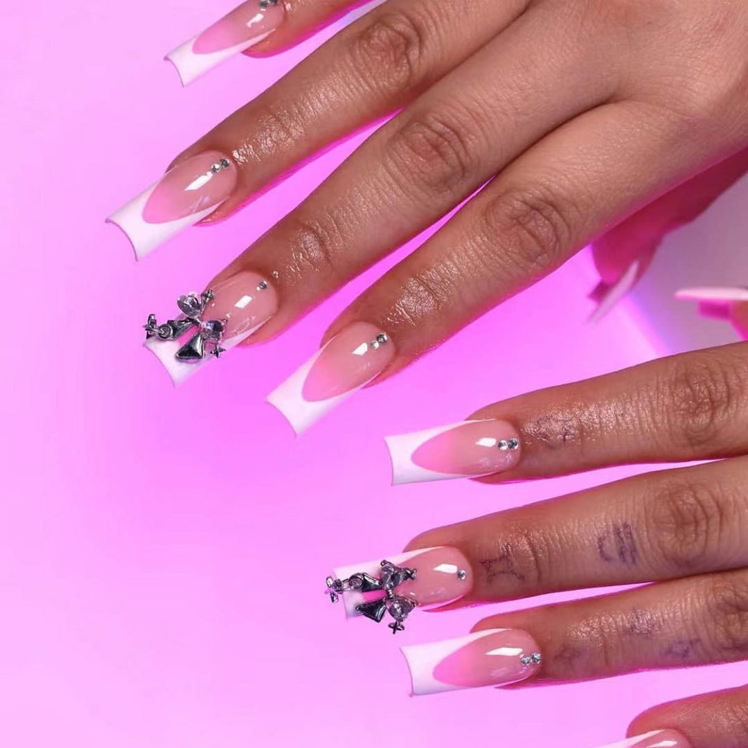Artificial nail set with luxurious French tips and elegant embellishments Kalsten