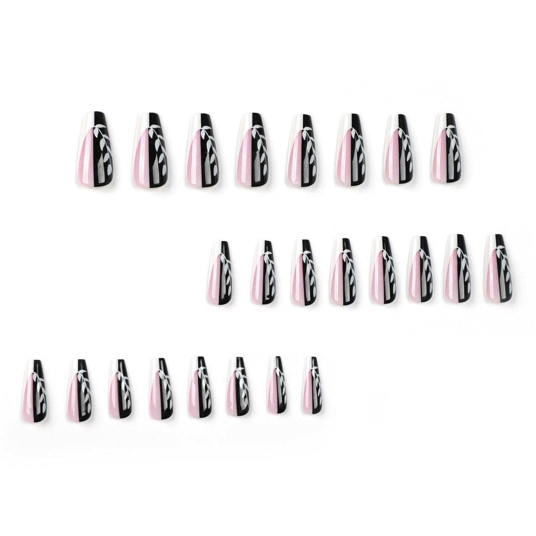 Artful nail extensions in elegant black and white design Kalsten