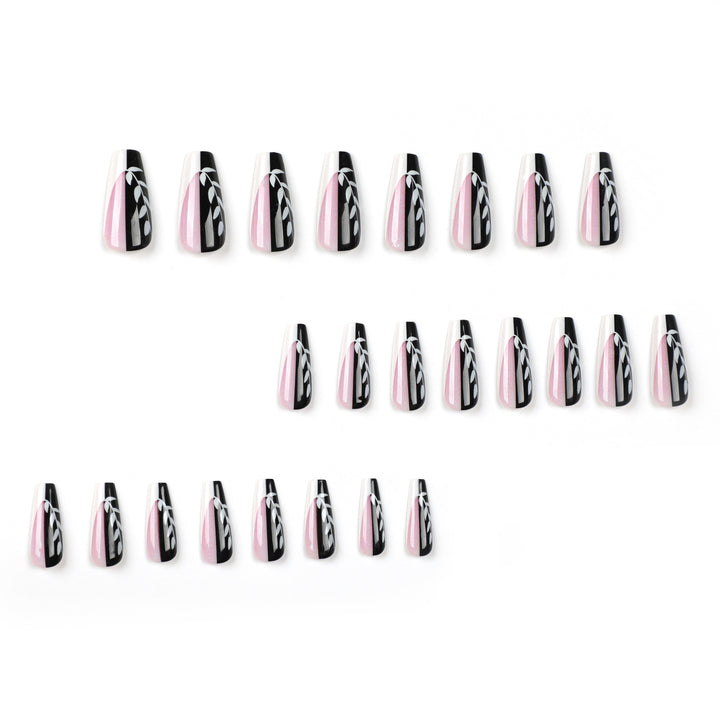 Artful nail extensions in elegant black and white design Kalsten