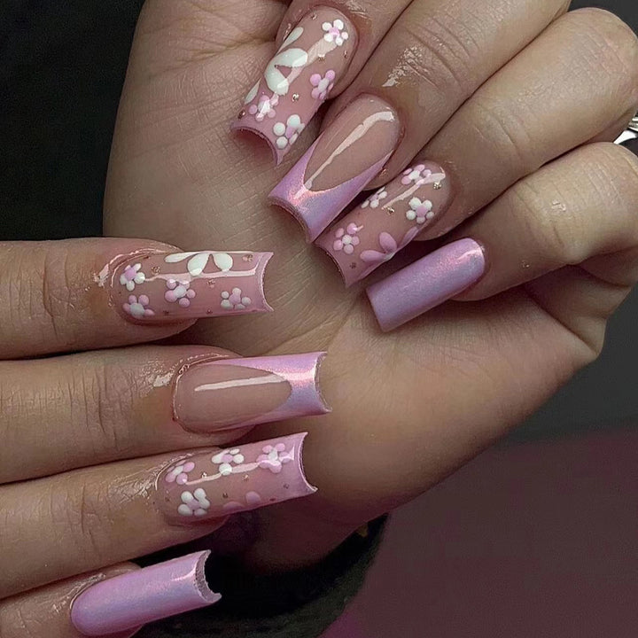 Artificial nail art with floral patterns and shine Kalsten