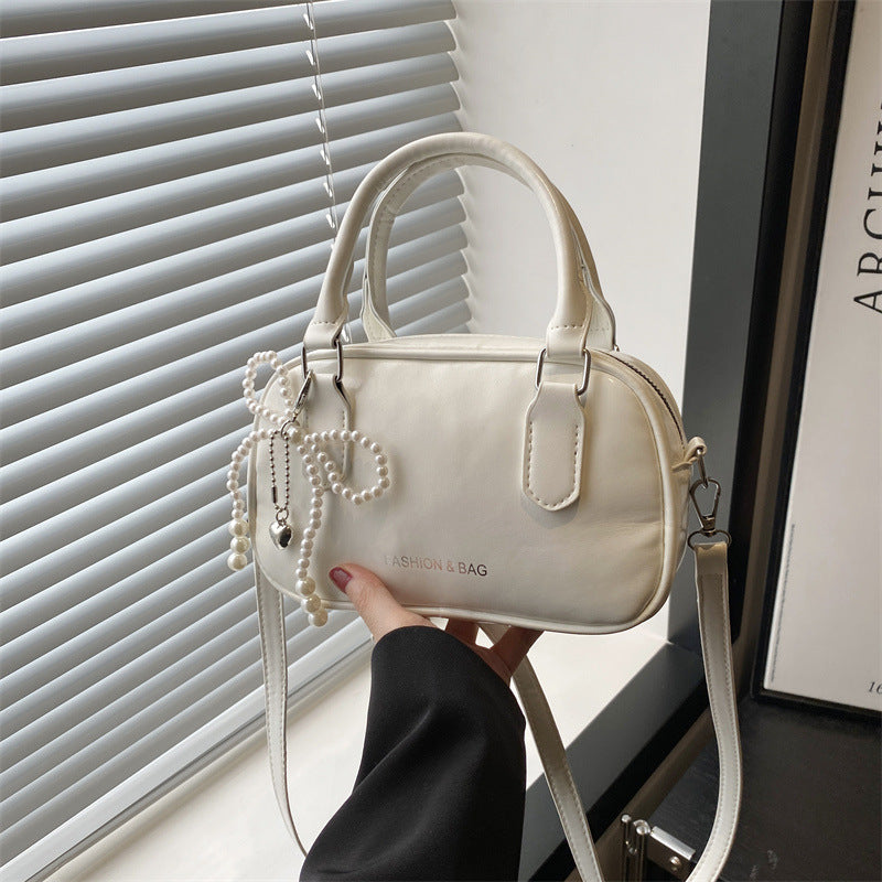 Elegant Pearl-Embellished Handheld Satchel