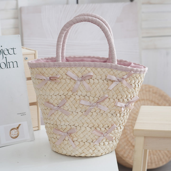 Basket bag with delicate bows and padded edge Kalsten