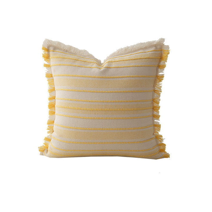Square cushion cover made of hand-woven cotton blend with decorative fringe trim Kalsten