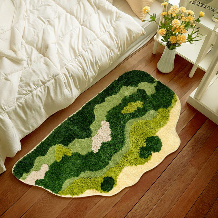 Shaped hand-tufted living room rug with moss-like structure and relief optics Kalsten
