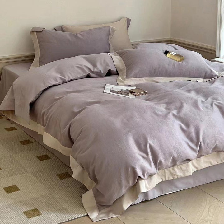 High-quality bedding set made of cotton satin with jacquard floral relief and contrasting hem finishing