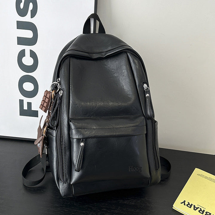 Durable Leather Backpack with Multi-Compartment Design