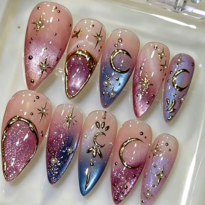 Glamorous artificial nails with star and moon motifs Kalsten