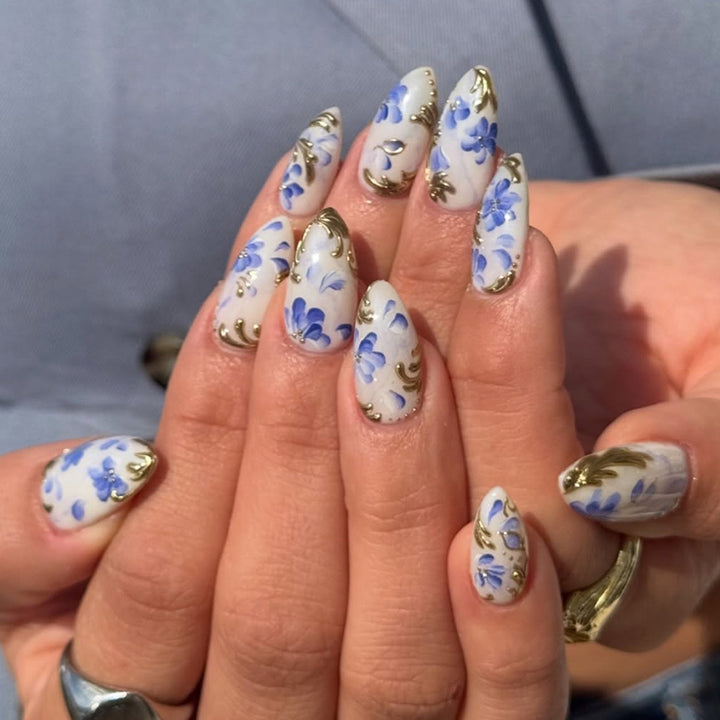 Artificial nails with exquisite floral and gold accents Kalsten