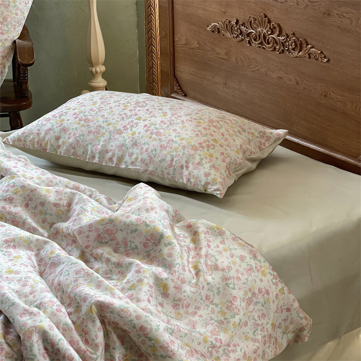 Satin bedding set with floral print and ruffle