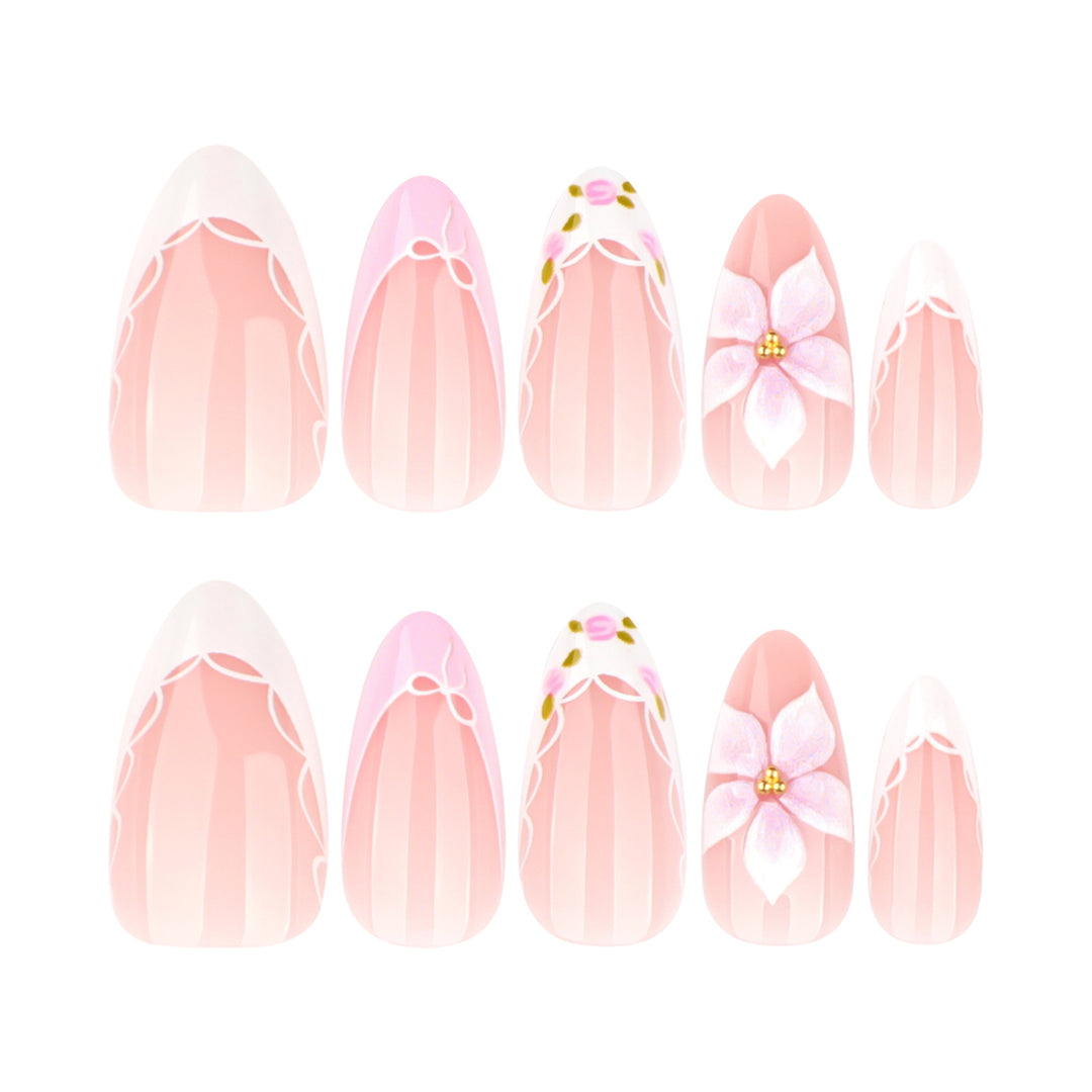 Artful nail extensions with delicate floral pattern and elegant accents Kalsten