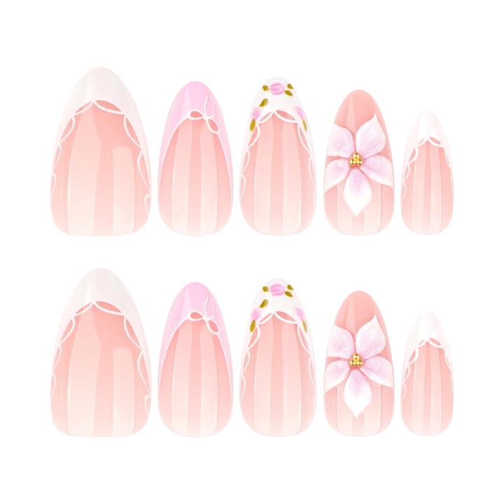 Artful nail extensions with delicate floral pattern and elegant accents Kalsten