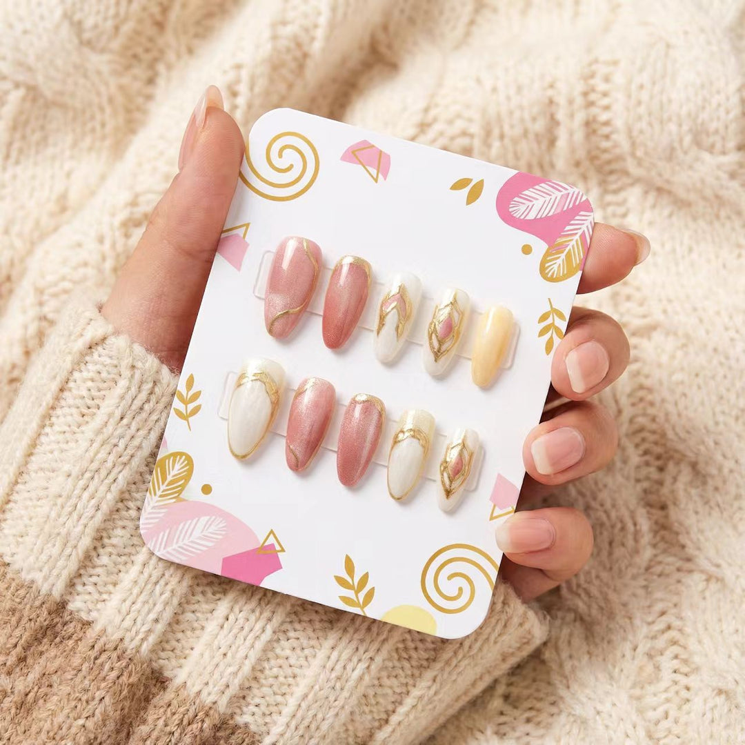Artificial nails with floral gold accents and glossy finish Kalsten