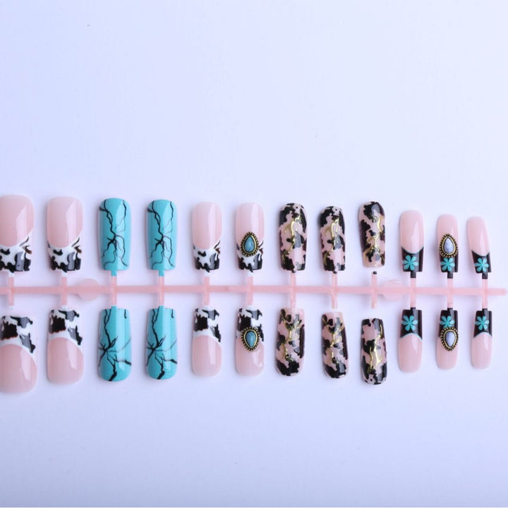Artful fingernails with unique marble and jewelry design Kalsten