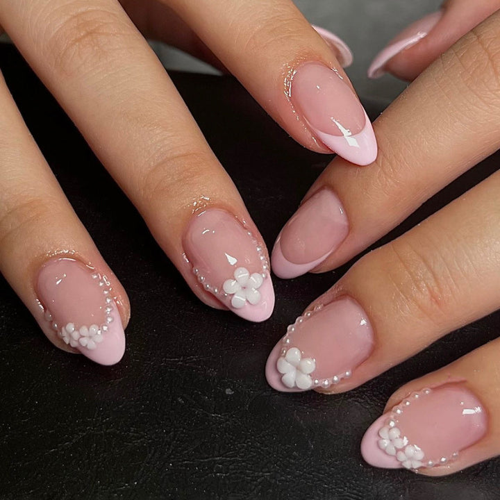 Artful acrylic nails with elegant floral accents Kalsten