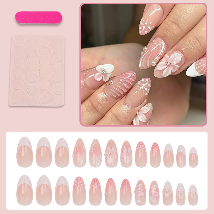 Acrylic nail set with elegant 3D flowers and embellished details Kalsten