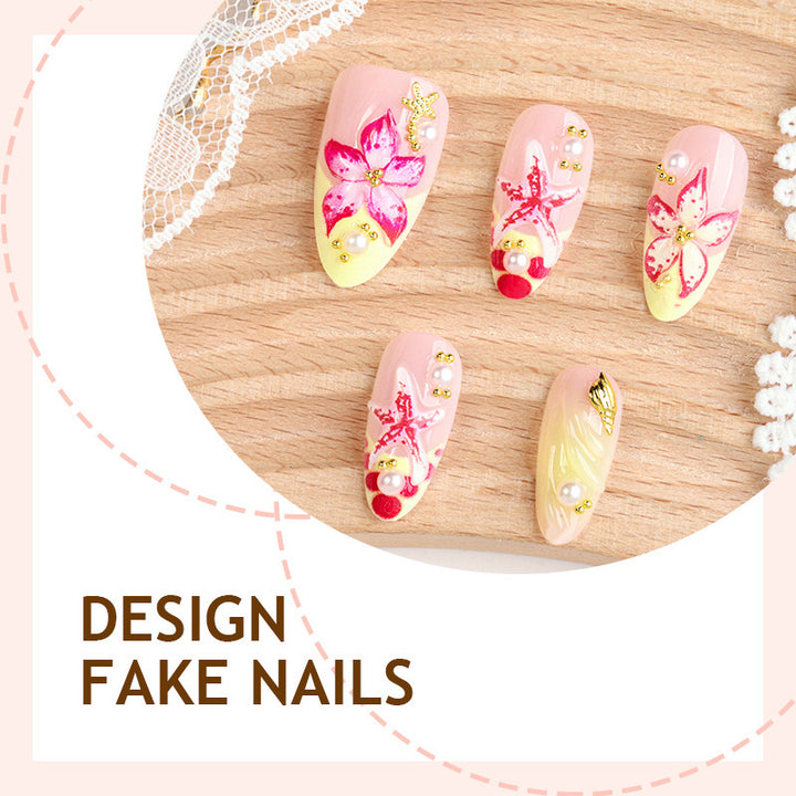 Artificial nail set with delicate floral decorations and glitter accents Kalsten