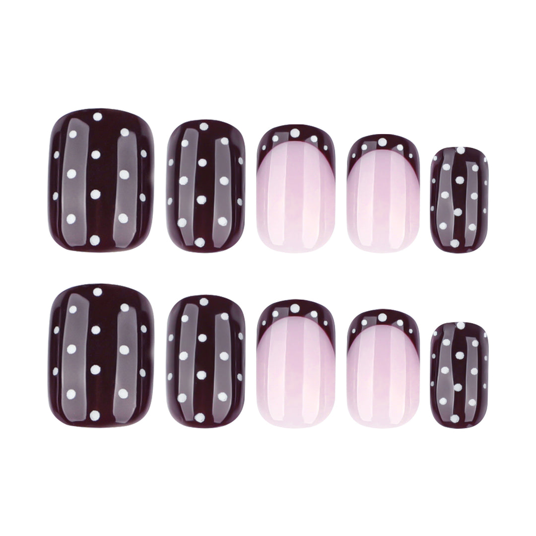 Artful nail art with elegant polka dot design Kalsten