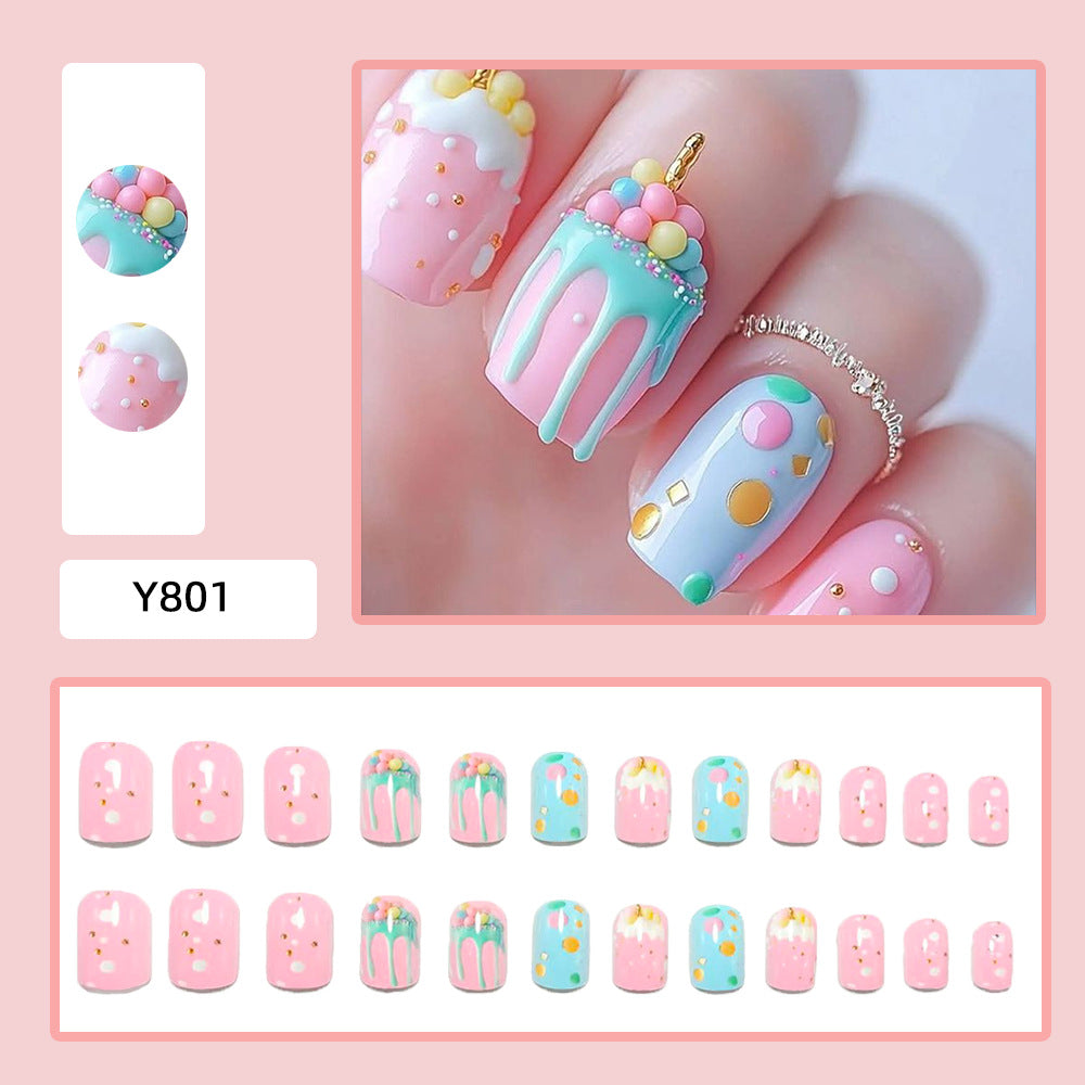Artificial nails with playful cupcake design Kalsten