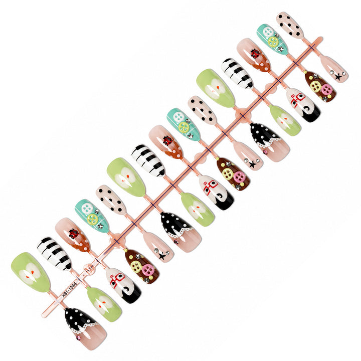 Creative nail art set with playful patterns and 3D details Kalsten