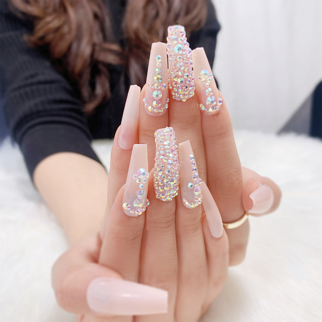 Glamorous nail extensions with rhinestone accents Kalsten