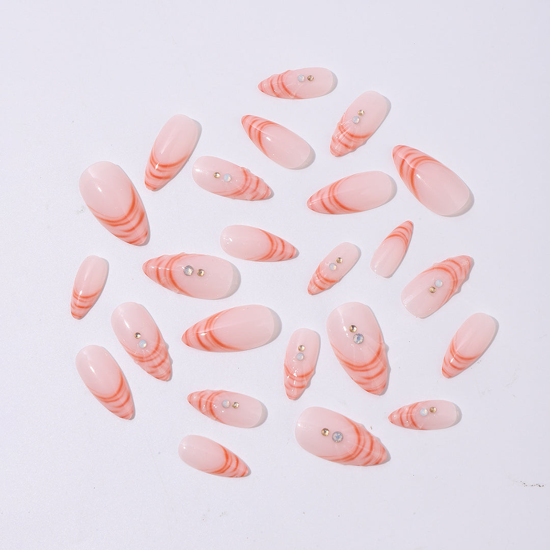 Acrylic nail set with curved tip style and glitter accents Kalsten