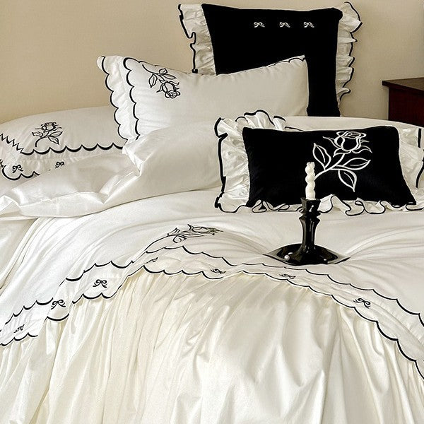 Elegant cotton satin bedding set with contrasting edge embroidery and frill