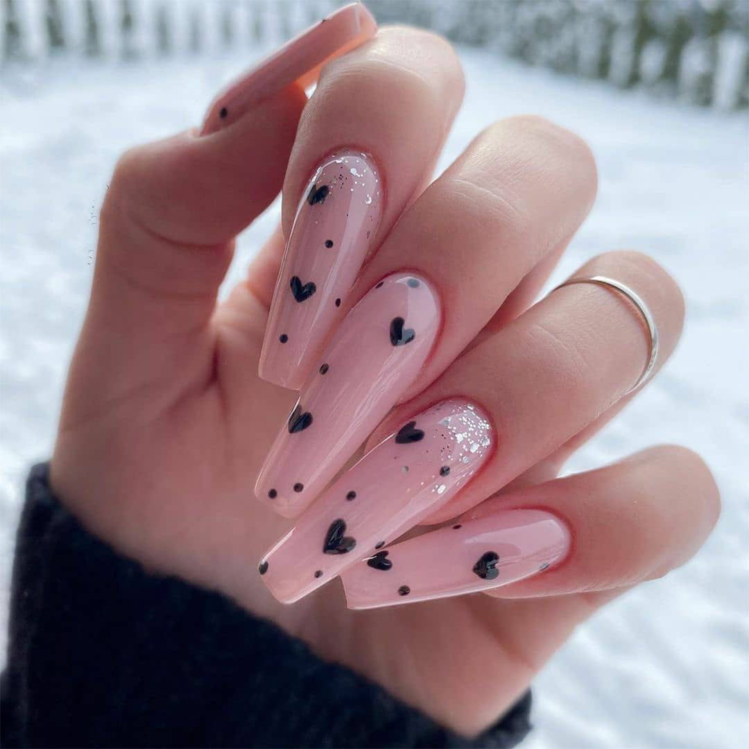 Artistic stiletto nails with heart design Kalsten