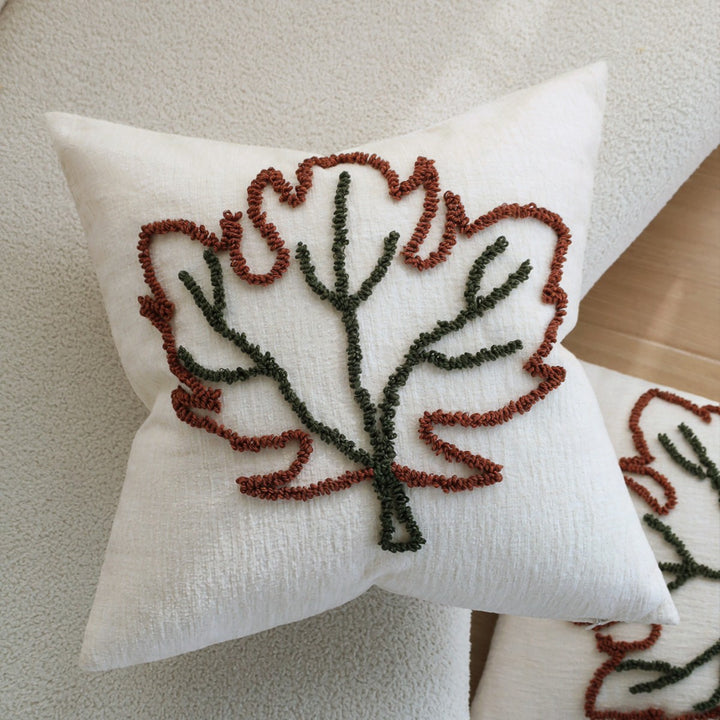 Square decorative pillow cover with hand-tufted leaf motif and fine linen texture Kalsten