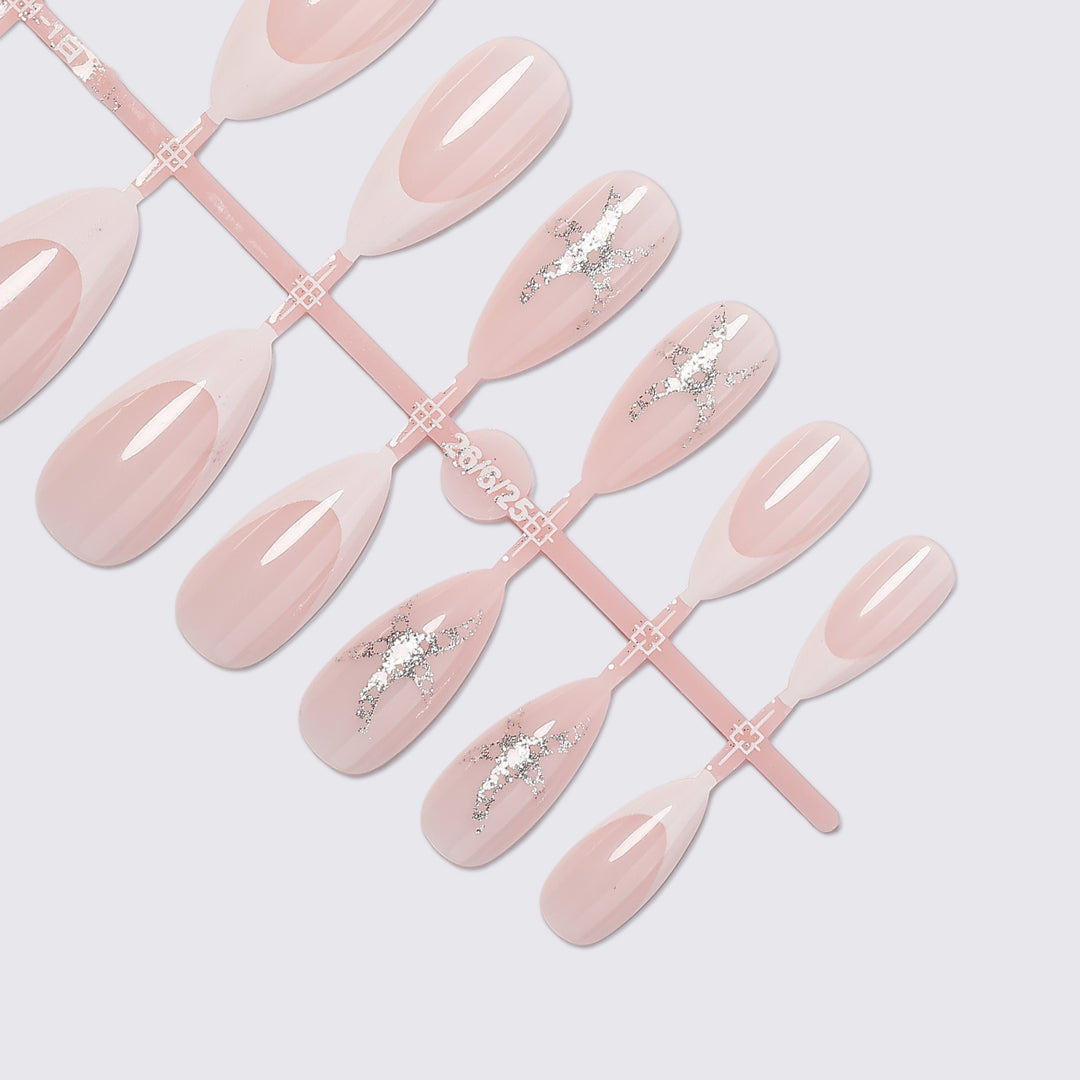 Artificial nail set with delicate pearlescent and glitter accents Kalsten
