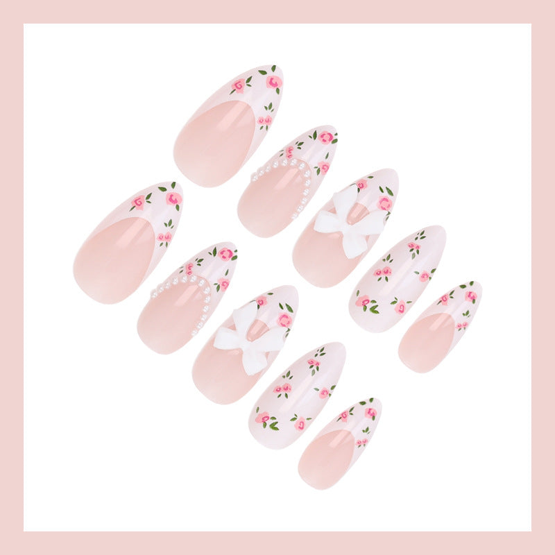 Artificial nail set with romantic flower motifs and elegant details Kalsten